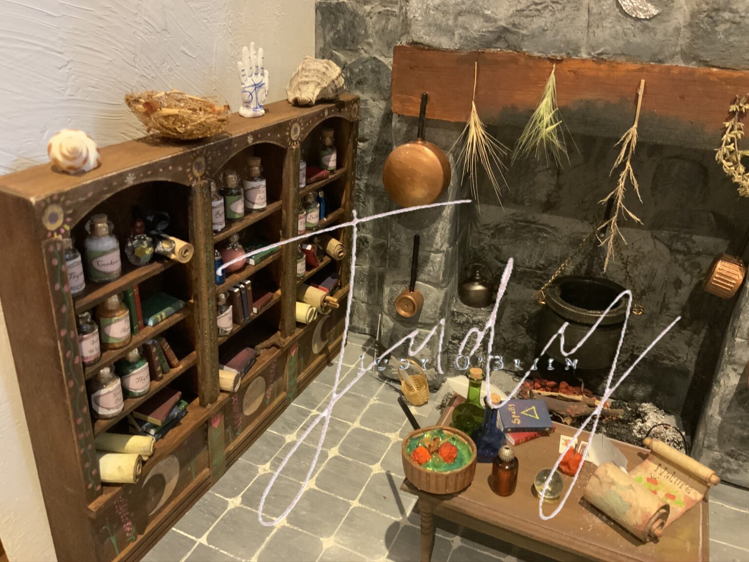 Close view of miniature shelves and worktable